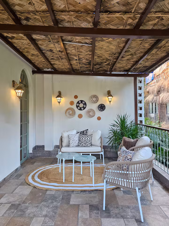 Outdoor seating area in the garden at Casa Amore